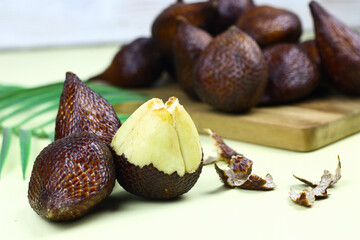 Group of Salak or Salacca zalacca one of Indonesian local fruits. Isolated background, selective focus.
