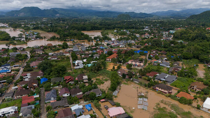 Aerial view of suburb area in Chiang Rai downtown flooding by Kok river after typhoon Yagi has swept Southeast Asia.