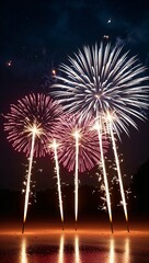 Glowing sparklers and firework bursts in the night background for invitation or card screensaver