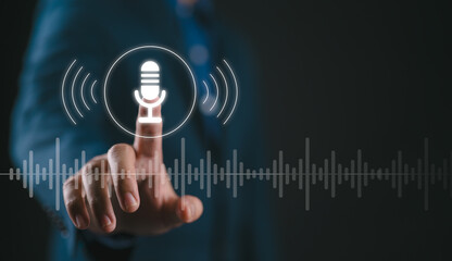 Business people Hand touch the microphone button on virtual screen. Blog speak talk advertising presentation, Voice recognition, speech detection and deep learning application, Voice Assistance