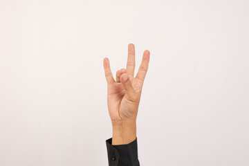 Naklejka premium Close-up of Caucasian male hand showing number seven gesture isolated on white studio background. Hand number concept for people with disabilities.