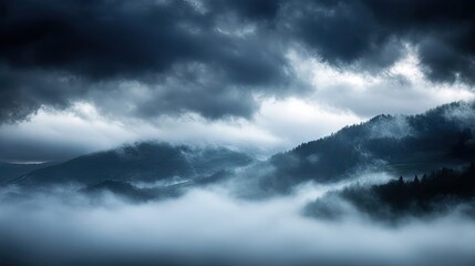 Fototapeta premium A Misty Mountain Landscape Under a Stormy Sky