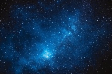 Obraz premium Starry night sky with deep blue tones, distant stars and constellations, mysterious and ethereal atmosphere with soft glow.