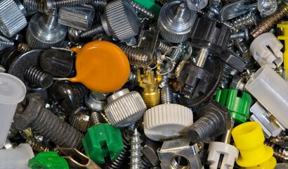 Computer fasteners hardware assorted odds and ends technology background.