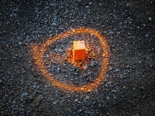 Survey wooden peg painted in bright orange color 