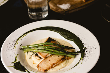 Lemon sole with butter and capers sauce and asparagus