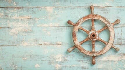 A rustic ship wheel is displayed against a faded wooden backdrop, highlighting its weathered charm and nautical themes