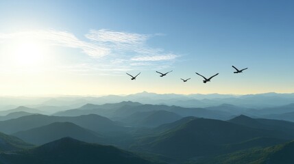 Fototapeta premium Birds Flying Over Mountain Landscape at Sunrise