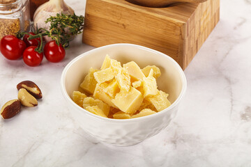 Crushed parmesan cheese in the bowl