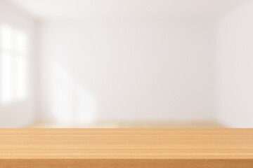 Empty space wooden table top and blur living interior background. Mockup scene display for products or texts presentation. 