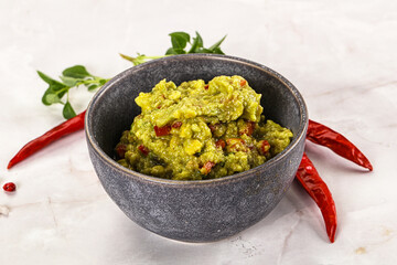 Guacamole with avocado, tomato and chili