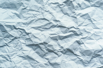 Obraz premium The texture of the white paper is crumpled—background for various purposes.