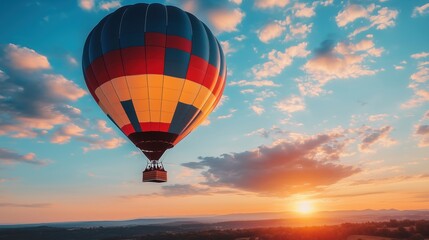 Fototapeta premium Hot air balloon soaring at sunset, vibrant colors, scenic landscape