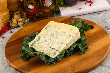 Blue cheese piece over board