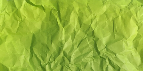 Obraz premium Vector illustration texture of crumpled paper. Parrot green crumple paper background.