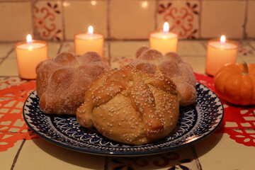 Traditional Pan de Muerto and candles