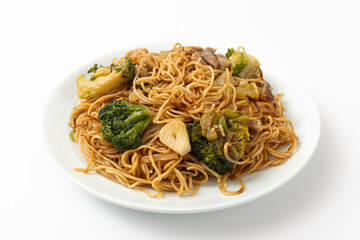 Stir-fried Hong Kong-style egg noodles on a white background