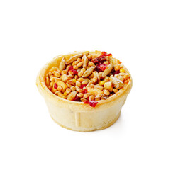 Nutritious seed mix served in a bowl with additional snacks for pet at home