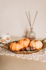 Handmade scented candles made of natural wax in the shape of a pumpkin