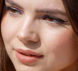 Naklejka premium Close-up portrait of a brunette girl