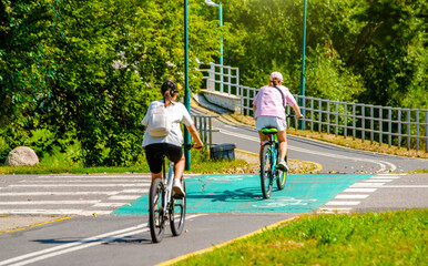 Cyclist ride on the bike path in the city Park
