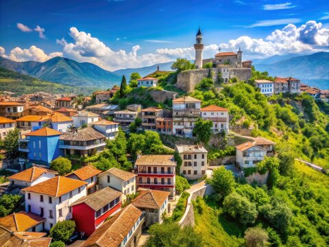 Scenic View of Elbasan's Historic Architecture Surrounded by Lush Greenery and Blue Sky