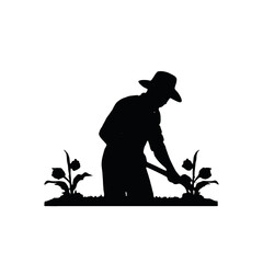 A silhouette of a farmer or gardener working in a field or garden