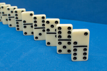 Dominoes bones on blue background	