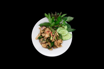 Spicy Roast Pork Salad Northeastern region in Thailand. Isolated on black background with clipping path.