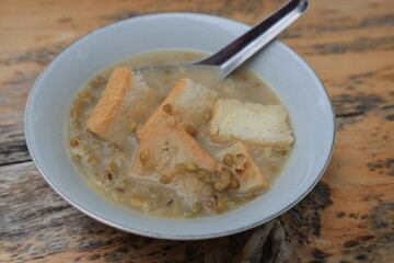 Mung bean porridge, or often shortened to burjo (bubur kacang hijau), is an Indonesian sweet porridge made from mung beans, coconut milk, and palm sugar or cane sugar.