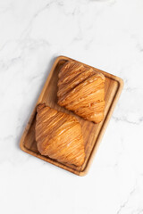freshly baked golden french croissants