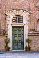 Close up of single door in Trastevere, Rome Italy