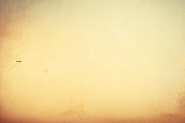 Obraz premium Faded orange sky with a soft gradient transitioning from warm orange tones to a lighter hue creating a vintage atmosphere 