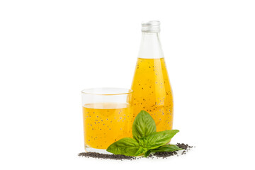 Diet detox cocktail with basil and chia seeds in glass jar and glass isolated on white background....