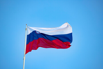 Slovenian flag on blue sky