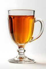 A clear cup with a handle filled with apple juice, isolated on  white background