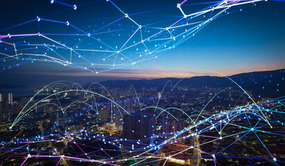 Futuristic network connecting a modern cityscape at night
