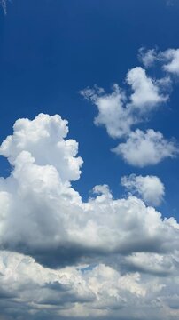 moving clouds against a blue sky captured in timelapse