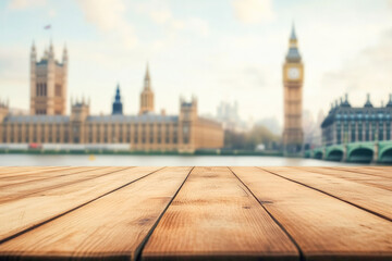 Obraz premium Empty wooden table with a blurred Big Ben and Houses of Parliament in London in the background, creating a space for product display or design montage. 