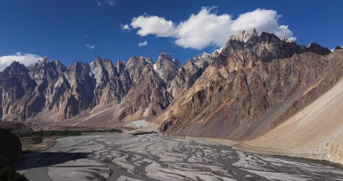Backward Drone Shot - Passu Cones Mountains. Hunza River, Pakistan