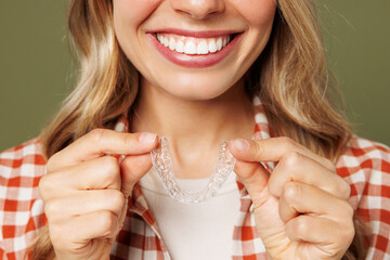Close up cropped photo shot of young smiling woman wear red shirt casual clothes hold in hand...