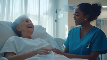 Obraz premium Nurse caring for elderly patient in hospital bed, smiling and listening to the woman's story during a session