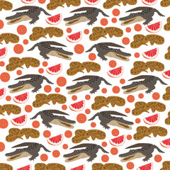 Fototapeta premium anaconda, crocodile with fruit as a pattern background