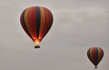 Two Hot Air Balloons in flight.