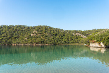 Calm Blue Lagoon on a Clear Summer Day – A Tropical Paradise for Relaxation