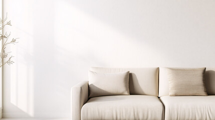 Minimalist beige sofa with one textured pillow, placed against a clean, white wall, emphasizing simplicity and negative space