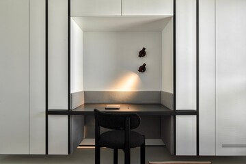 Explore the beauty of a modern minimalist workspace with elegant, stylish lighting