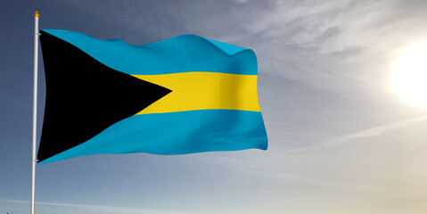 The Bahamas national flag cloth fabric waving on beautiful grey sky Background.