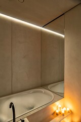 Explore a Modern Minimalist Bathroom with Elegant Lighting and Thoughtful Design for comfort