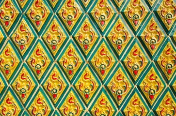 Thai Benjarong pattern on the wall of a church in Thailand